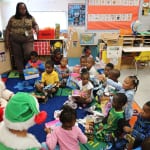 More excitement from the kids as they interact with Santa and open their gifts. 2 150x150 photo 更兴奋的孩子们互动智慧h Santa and open their gifts. 2 150x150 Potter Elementary School