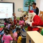 Santa handing out gifts as all the kids waited patiently and with full excitement. 150x150 photo Santa handing out gifts as all the kids waited patiently and with full excitement. 150x150 Potter Elementary School
