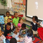 The kids getting ready to open their gifts. 150x150 photo The kids getting ready to open their gifts. 150x150 Potter Elementary School